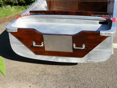 The finished transom; handles fitted and sacrificial motor pad in aluminium.